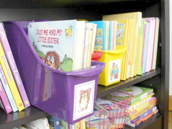 How to organize and declutter a kids book shelf using baskets and labeled book bins